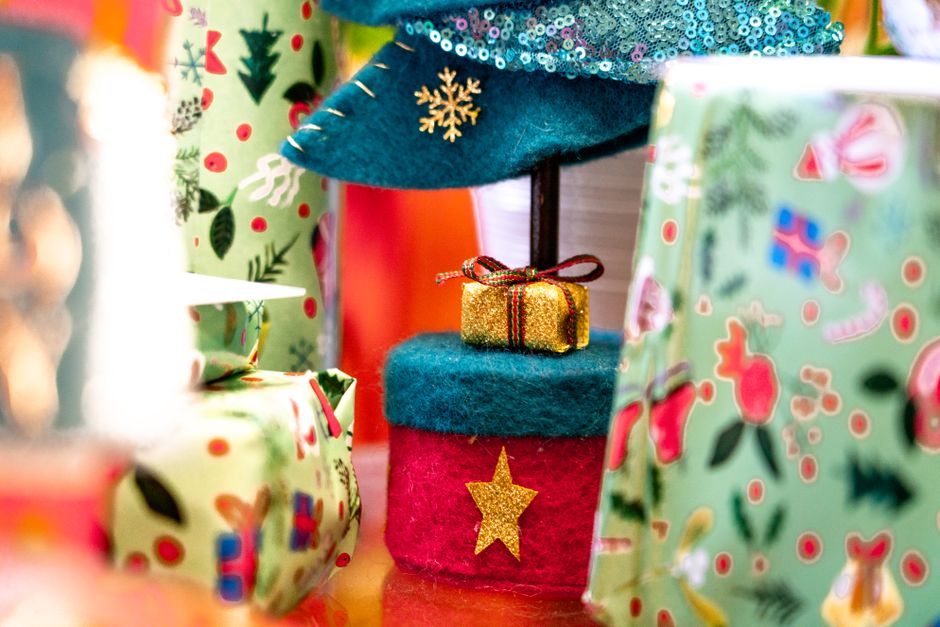 Vibrant Christmas themed decorations with neatly wrapped gifts and colorful patterns.