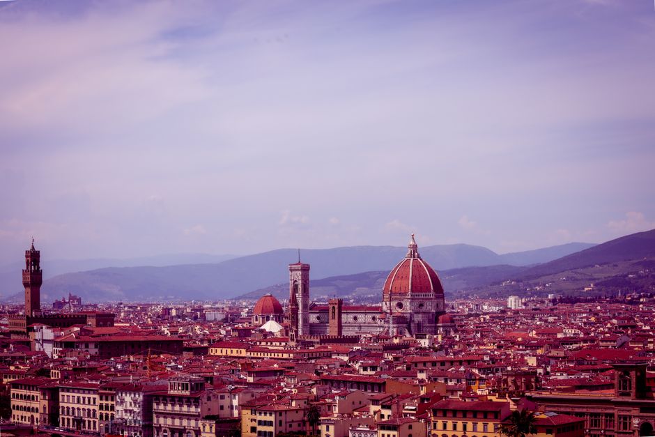 Stunning aerial view of Florence showcasing the iconic Duomo and surrounding cityscape.
