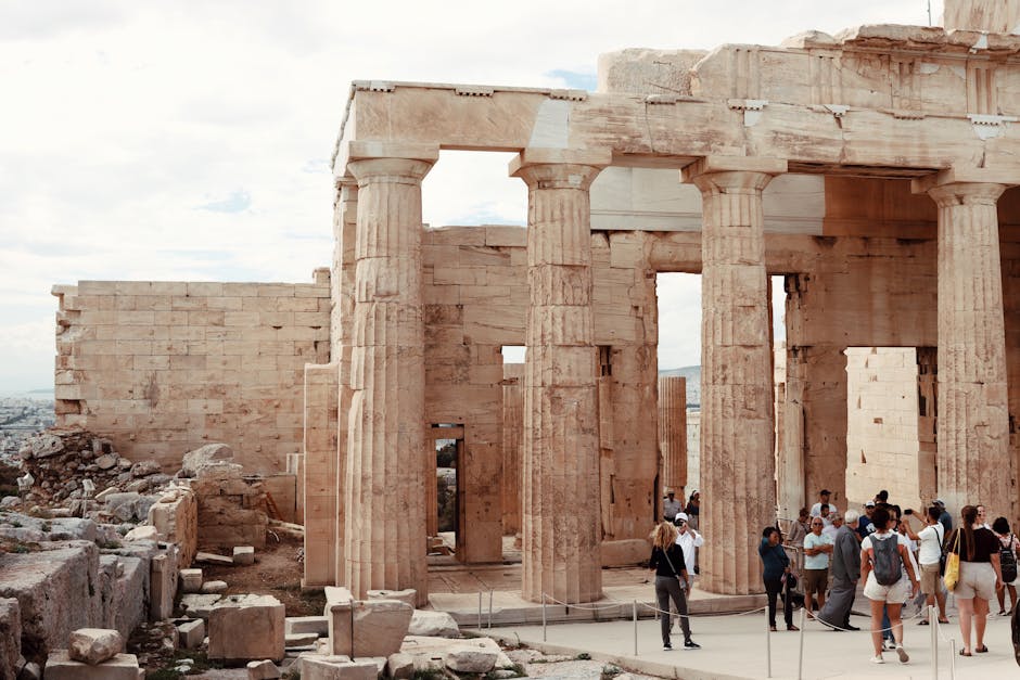 Visitors explore the iconic Parthenon, an emblem of ancient Greek architecture, in Athens, Greece.